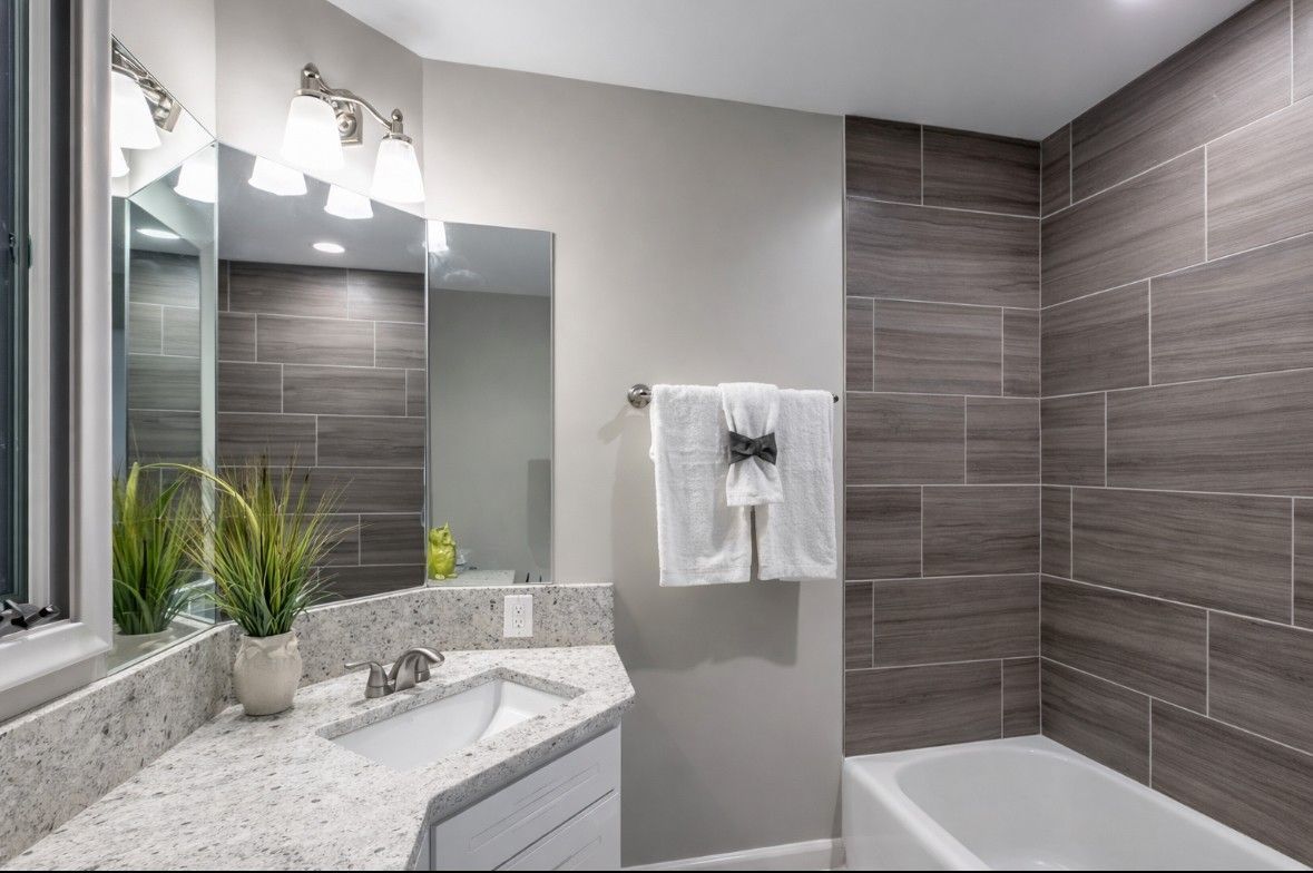 Remodeled bathroom by DeLoa & Sons Construction